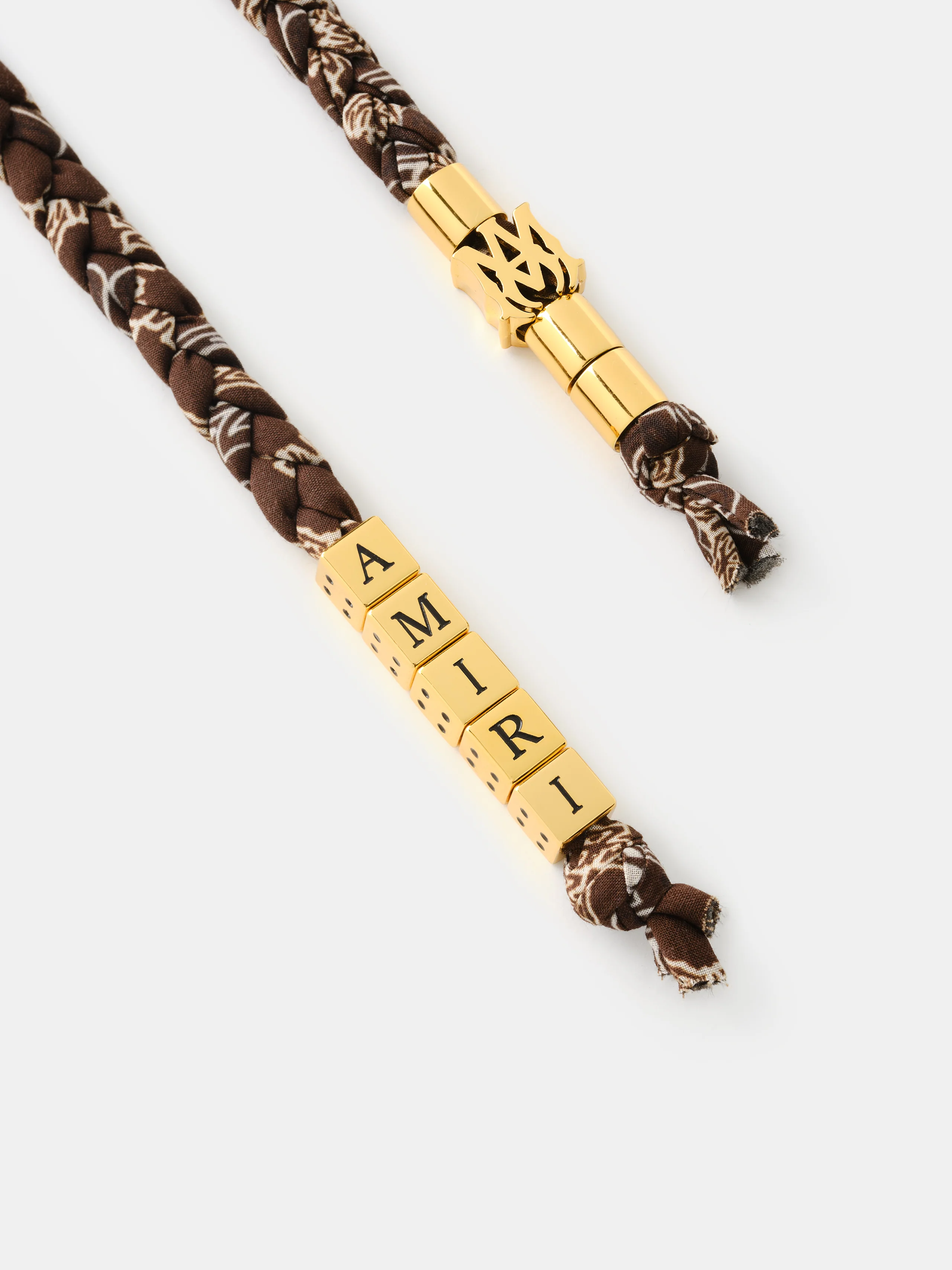 25-women-women-s-amiri-braided-keychain-tobacco-1.webp WOMEN - WOMEN'S AMIRI BRAIDED KEYCHAIN - Tobacco