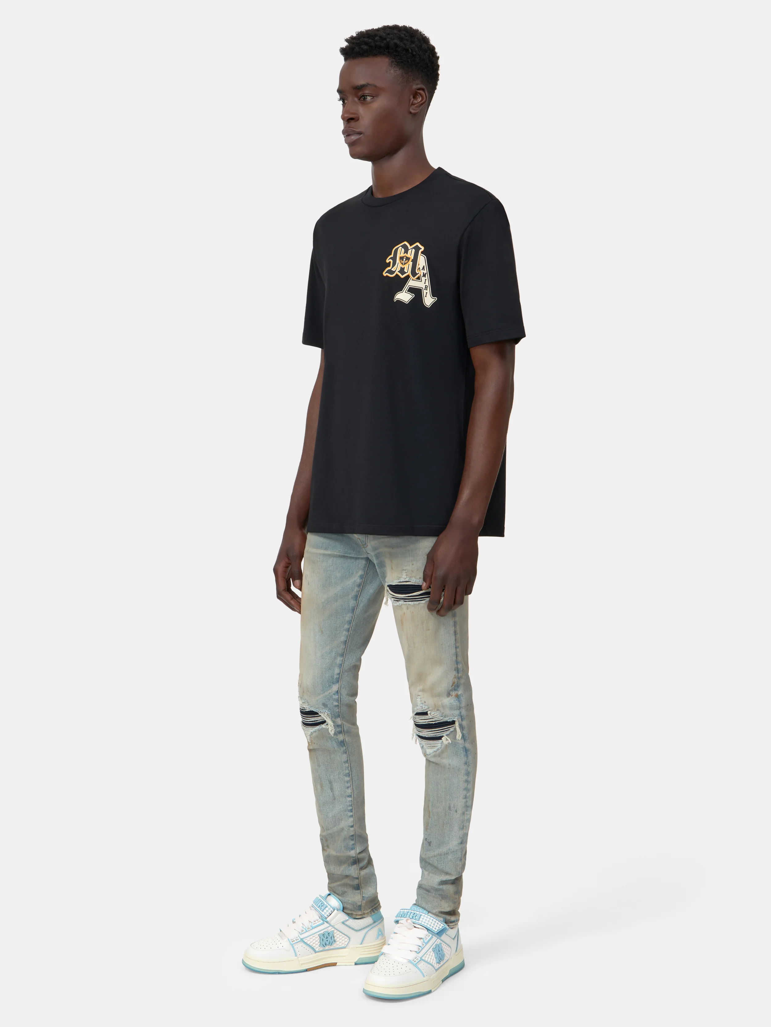 3000-varsity-patch-tee-black-3.webp VARSITY PATCH TEE - Black