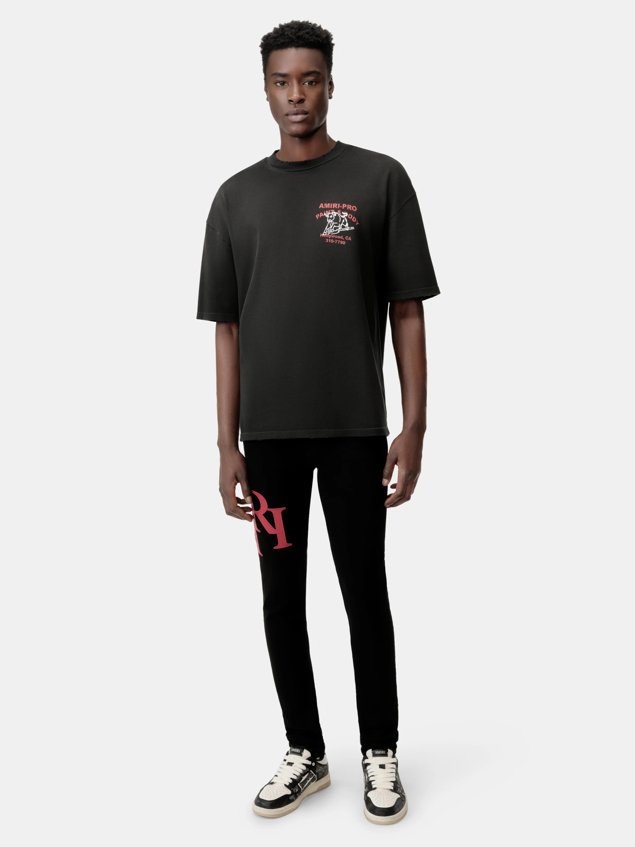 STAGGERED LOGO SKINNY JEAN- Black Red